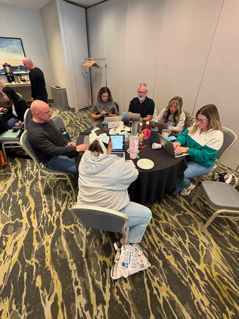 Brokers building workflows at a table